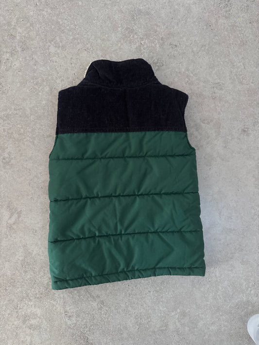 Carter's green puffer vest with a black corduroy yoke and sherpa collar