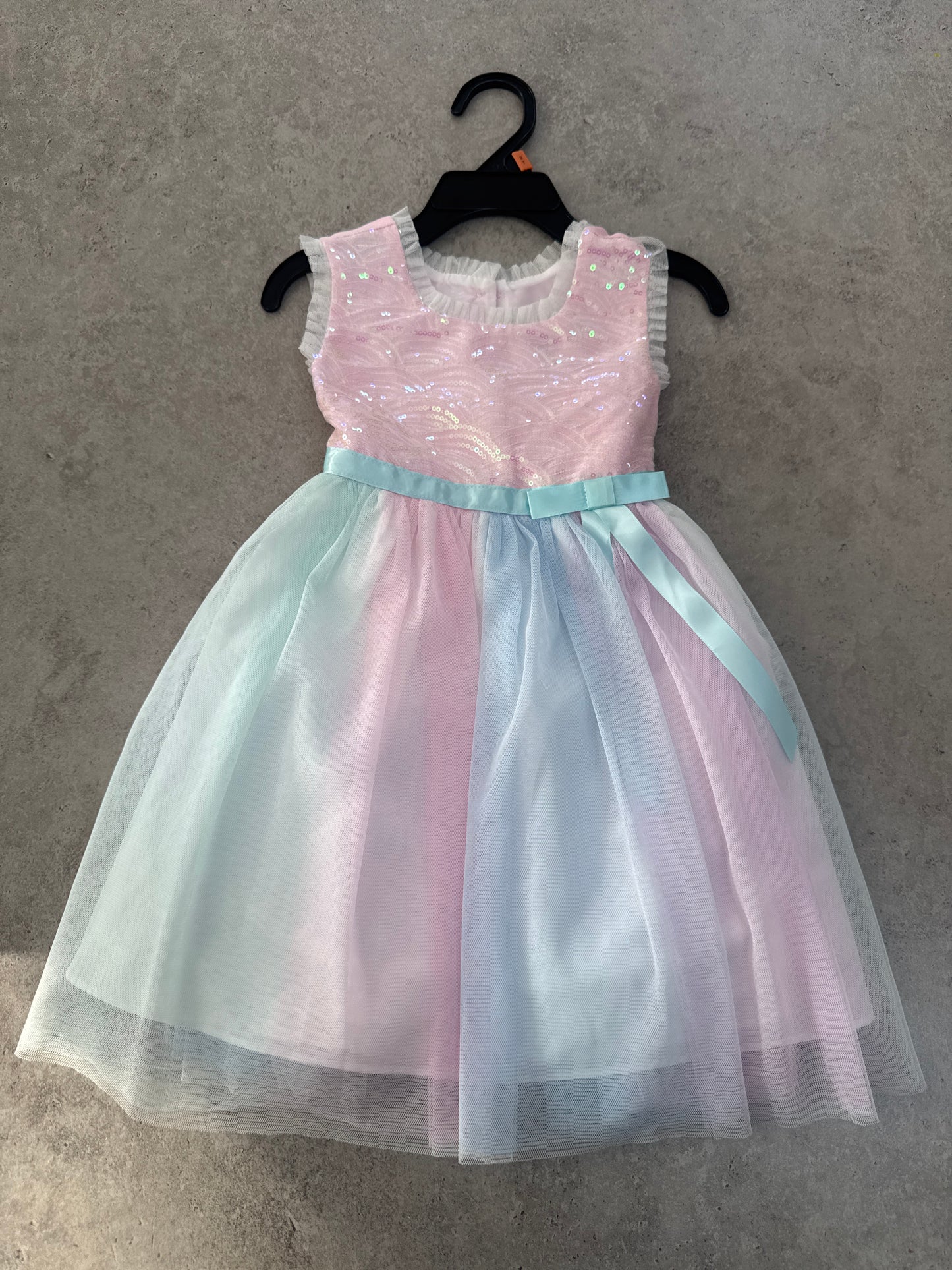New without tags Jona Michelle sleeveless sequin and pastel tulle dress with a blue ribbon waist
