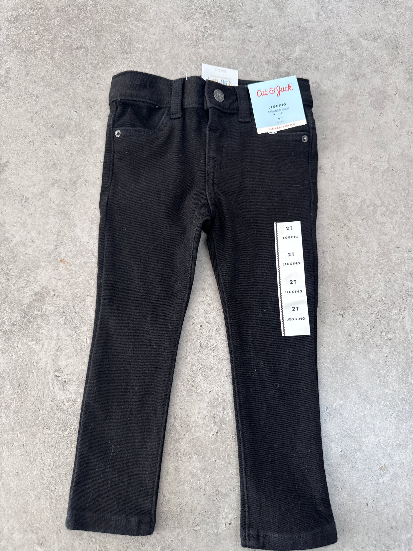 NWT black Cat & Jack jeggings in size 2T.
