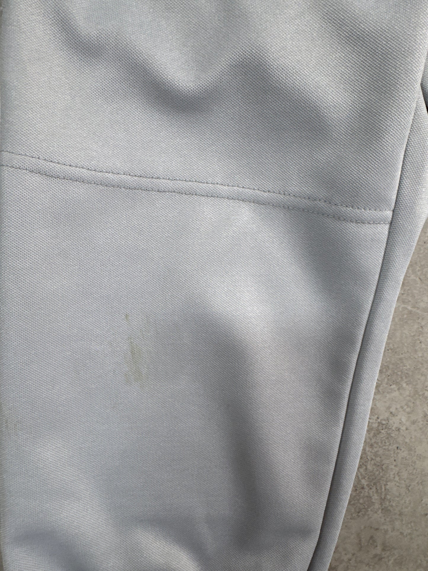 gray athletic baseball pants (with stain)